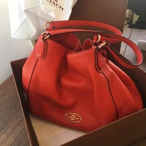 Brand New, never used orange leather Coach handbag